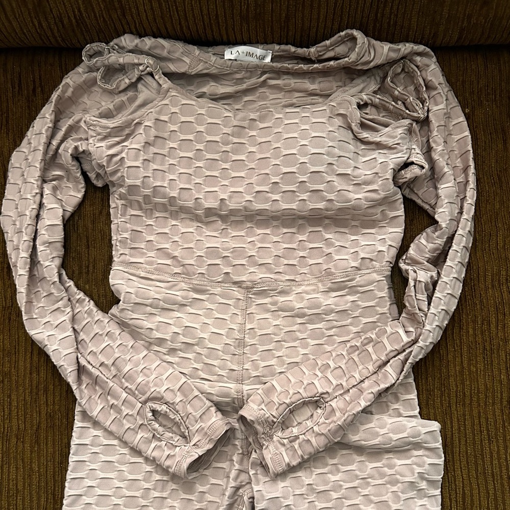 Gym romper with sleeve add on